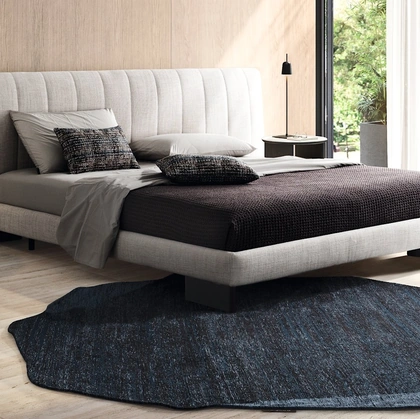 Tappeto Roche con forma irregolare che ricorda una roccia di Calligaris