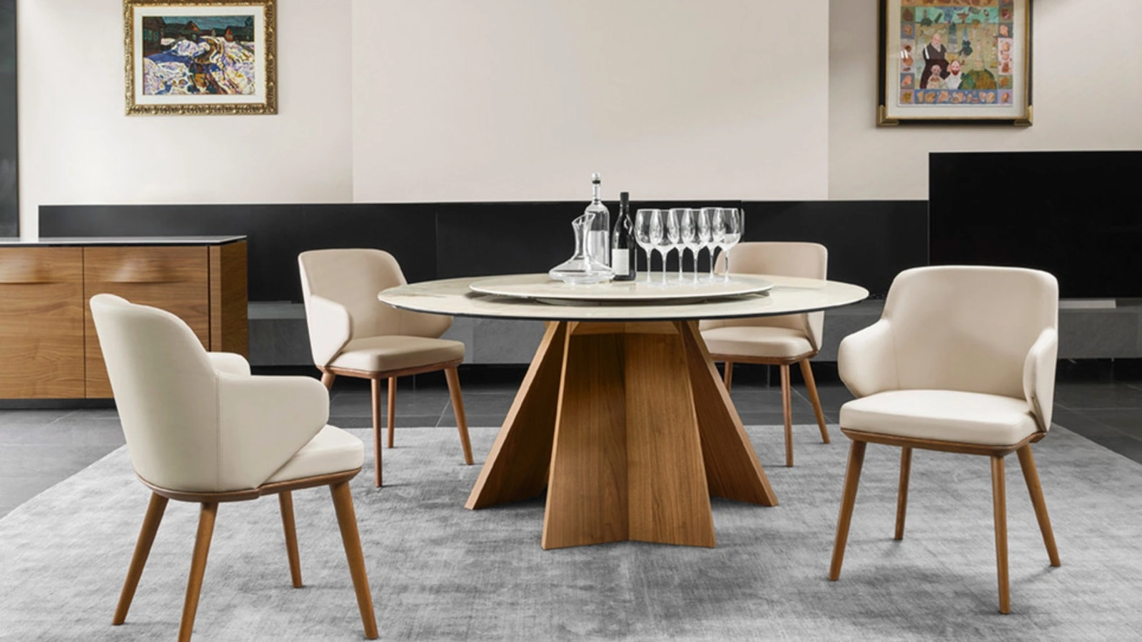 Tavolo rotondo con piano in ceramica e basamento in legno Icaro di Calligaris